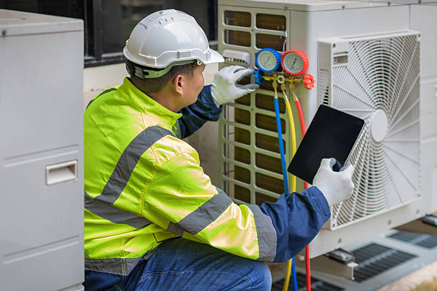Professional Heat Pump Repair technician working in Markle, IN